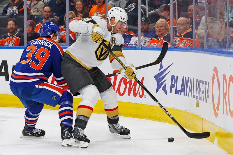 Apr 10, 2024; Edmonton, Alberta, CAN; Vegas Golden Knights defensemen Brayden McNabb (3) and Edmonton Oilers forward Sam Carrick (39) Battle along the boards for a loose puck  during the third period at Rogers Place. Mandatory Credit: Perry Nelson-USA TODAY Sports