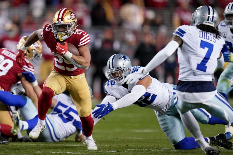 San Francisco 49ers running back Elijah Mitchell (25) runs against the Dallas Cowboys during the second half of an NFL divisional playoff football game in Santa Clara, Calif., Sunday, Jan. 22, 2023. (AP Photo/Godofredo A. Vásquez)