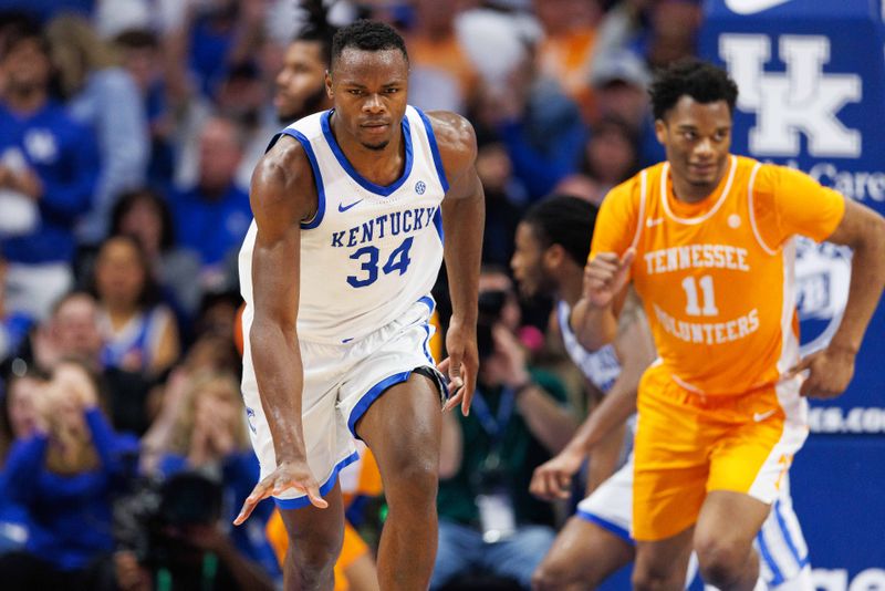 Feb 18, 2023; Lexington, Kentucky, USA; Kentucky Wildcats forward Oscar Tshiebwe (34) celebrates during the first half against the Tennessee Volunteers at Rupp Arena at Central Bank Center. Mandatory Credit: Jordan Prather-USA TODAY Sports