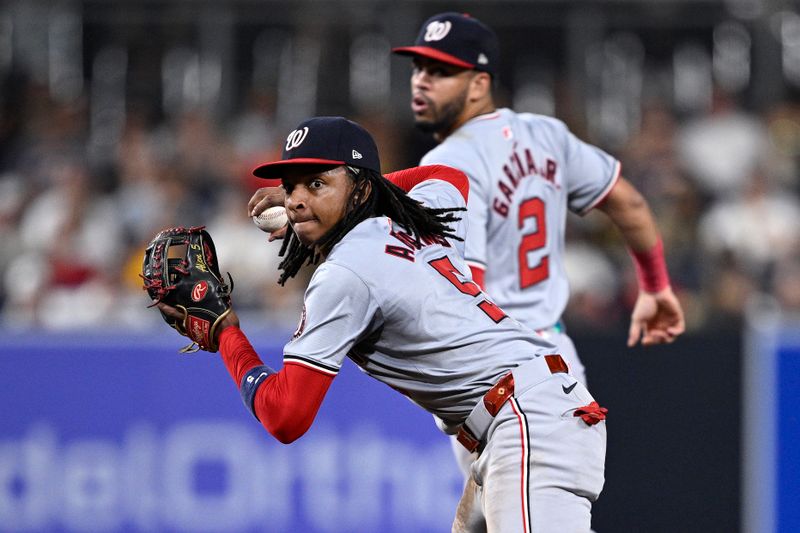 Jun 24, 2024; San Diego, California, USA; Washington Nationals shortstop CJ Abrams (5) throws to first base on a ground out by San Diego Padres center fielder Jackson Merrill (not pictured) during the seventh inning at Petco Park. Mandatory Credit: Orlando Ramirez-USA TODAY Sports