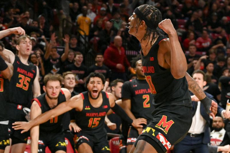 Jan 25, 2023; College Park, Maryland, USA;  Maryland Terrapins forward Julian Reese (10) pumps his fist after scoring during the second half against the Wisconsin Badgers at Xfinity Center. Mandatory Credit: Tommy Gilligan-USA TODAY Sports