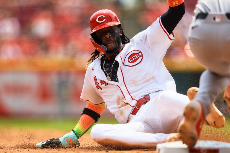 Aug 4, 2024; Cincinnati, Ohio, USA; Cincinnati Reds shortstop Elly De La Cruz (44) steals third in the sixth inning against the San Francisco Giants at Great American Ball Park. Mandatory Credit: Katie Stratman-USA TODAY Sports