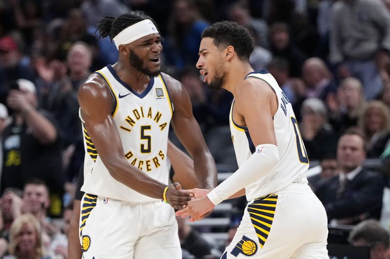 INDIANAPOLIS, INDIANA - NOVEMBER 06: Jarace Walker #5 and Tyrese Haliburton #0 of the Indiana Pacers celebrate in the fourth quarter against the Orlando Magic at Gainbridge Fieldhouse on November 06, 2024 in Indianapolis, Indiana. NOTE TO USER: User expressly acknowledges and agrees that, by downloading and or using this photograph, User is consenting to the terms and conditions of the Getty Images License Agreement. (Photo by Dylan Buell/Getty Images)