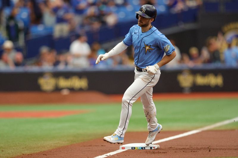 Aug 27, 2023; St. Petersburg, Florida, USA;  Tampa Bay Rays second baseman Brandon Lowe (8) runs the bases after hitting a home run against the New York Yankees in the first inning at Tropicana Field. Mandatory Credit: Nathan Ray Seebeck-USA TODAY Sports