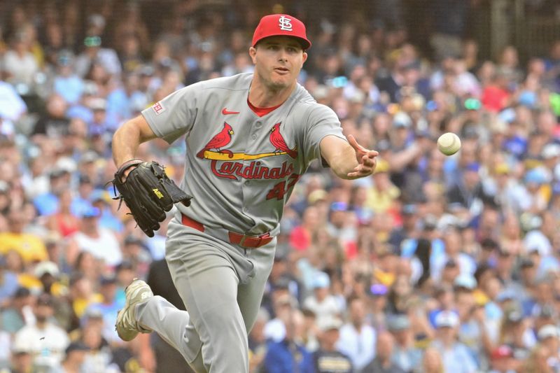 Sep 14, 2025; Milwaukee, Wisconsin, USA;  St. Louis Cardinals relief pitcher John King (47) tosses out Milwaukee Brewers designated hitter Christian Yelich (not pictured) in the sixth inningat American Family Field. Mandatory Credit: Benny Sieu-Imagn Images