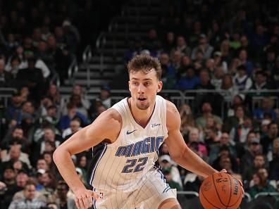 MILWAUKEE, WI - DECEMBER 21:  Franz Wagner #22 of the Orlando Magic handles the ball during the game against the Milwaukee Bucks on December 21, 2023 at the Fiserv Forum Center in Milwaukee, Wisconsin. NOTE TO USER: User expressly acknowledges and agrees that, by downloading and or using this Photograph, user is consenting to the terms and conditions of the Getty Images License Agreement. Mandatory Copyright Notice: Copyright 2023 NBAE (Photo by Gary Dineen/NBAE via Getty Images).