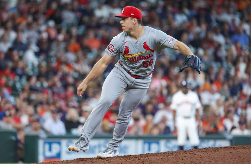 Jun 5, 2024; Houston, Texas, USA; St. Louis Cardinals relief pitcher Ryan Helsley (56) delivers a pitch during the ninth inning against the Houston Astros at Minute Maid Park. Mandatory Credit: Troy Taormina-USA TODAY Sports