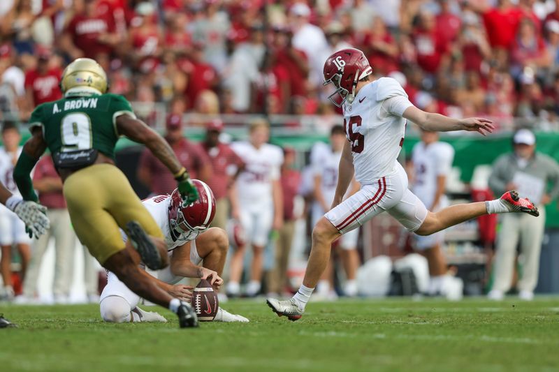 Sep 16, 2023; Tampa, Florida, USA; Alabama Crimson Tide place kicker Will Reichard (16)  kicks a field goal against the South Florida Bulls in the second quarter at Raymond James Stadium. Mandatory Credit: Nathan Ray Seebeck-USA TODAY Sports