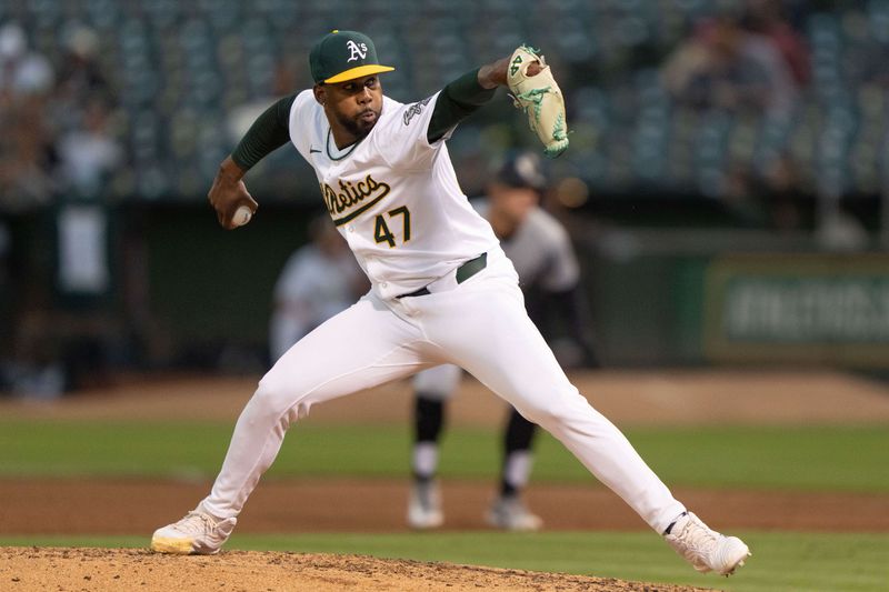 Aug 6, 2024; Oakland, California, USA;  Oakland Athletics pitcher Michel Otañez (47) pitches during the sixth inning against the Chicago White Sox at Oakland-Alameda County Coliseum. Mandatory Credit: Stan Szeto-USA TODAY Sports