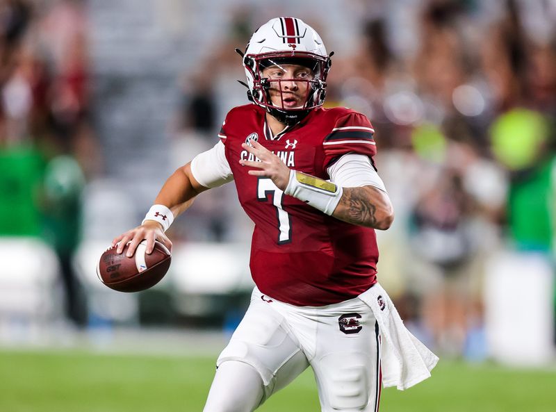 Sep 24, 2022; Columbia, South Carolina, USA; South Carolina Gamecocks quarterback Spencer Rattler (7) scrambles against the Charlotte 49ers in the second half at Williams-Brice Stadium. Mandatory Credit: Jeff Blake-USA TODAY Sports