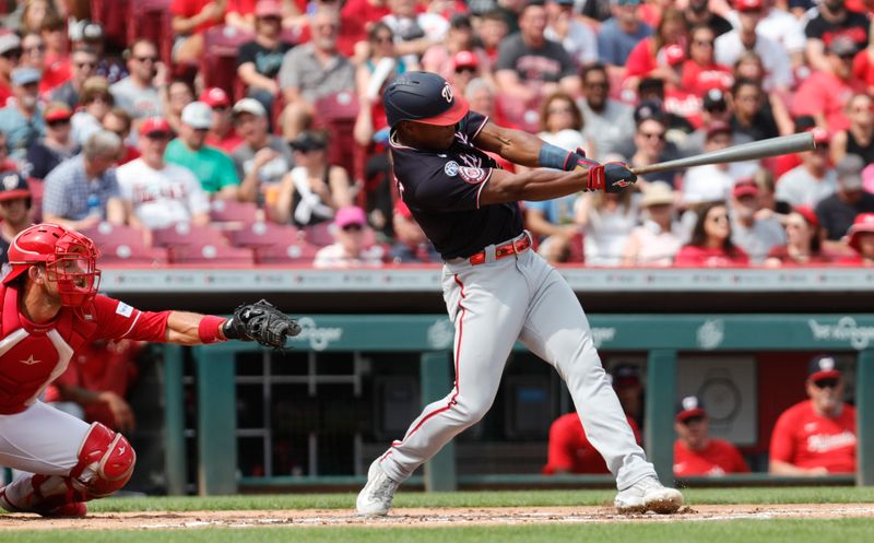 Aug 5, 2023; Cincinnati, Ohio, USA; Washington Nationals left fielder Stone Garrett (36) hits an RBI double against the Cincinnati Reds during the first inning at Great American Ball Park. Mandatory Credit: David Kohl-USA TODAY Sports