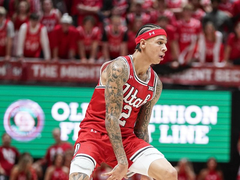 Jan 10, 2026; Salt Lake City, Utah, USA; Utah Utes guard Terrence Brown (2) dribbles the ball during the second half against the BYU Cougars at Jon M. Huntsman Center. Mandatory Credit: Aaron Baker-Imagn Images