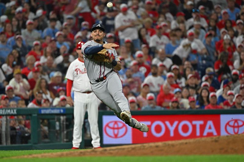 Aug 31, 2025; Philadelphia, Pennsylvania, USA;  Atlanta Braves shortstop Nacho Alvarez Jr. (67) throws to first base during the fourth inning Philadelphia Phillies at Citizens Bank Park. Mandatory Credit: Eric Hartline-Imagn Images