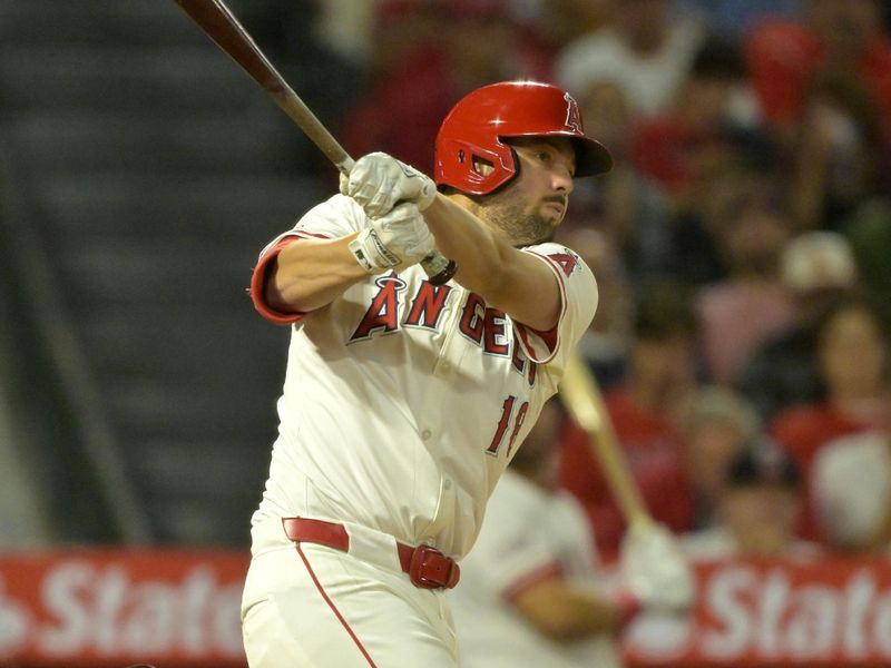 Sep 17, 2024; Anaheim, California, USA;  Los Angeles Angels first baseman Nolan Schanuel (18) doubles in a run in the fifth inning against the Chicago White Sox at Angel Stadium. Mandatory Credit: Jayne Kamin-Oncea-Imagn Images