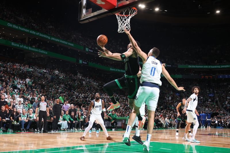BOSTON, MA - JUNE 9: Jayson Tatum #0 of the Boston Celtics drives to the basket during the game against the Dallas Mavericks during Game 1 of the 2024 NBA Finals on June 9, 2024 at the TD Garden in Boston, Massachusetts. NOTE TO USER: User expressly acknowledges and agrees that, by downloading and or using this photograph, User is consenting to the terms and conditions of the Getty Images License Agreement. Mandatory Copyright Notice: Copyright 2024 NBAE  (Photo by Nathaniel S. Butler/NBAE via Getty Images)