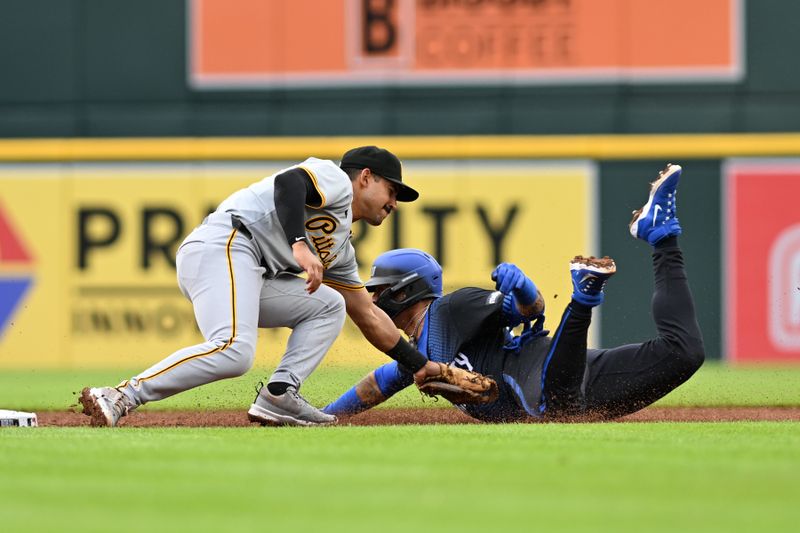 May 29, 2024; Detroit, Michigan, USA;  Pittsburgh Pirates second baseman Nick Gonzales (39) tags out Detroit Tigers shortstop Javier Báez (28) on a steal attempt at second base in the second inning at Comerica Park. Mandatory Credit: Lon Horwedel-USA TODAY Sports