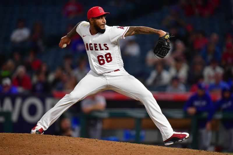 Sep 26, 2023; Anaheim, California, USA; Los Angeles Angels relief pitcher Jose Marte (68) throws against the Texas Rangers during the eighth inning at Angel Stadium. Mandatory Credit: Gary A. Vasquez-USA TODAY Sports