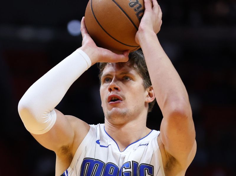 MIAMI, FLORIDA - FEBRUARY 06: Moritz Wagner #21 of the Orlando Magic shoots a free throw against the Miami Heat during the first quarter of the game at Kaseya Center on February 06, 2024 in Miami, Florida. NOTE TO USER: User expressly acknowledges and agrees that, by downloading and or using this photograph, User is consenting to the terms and conditions of the Getty Images License Agreement. (Photo by Megan Briggs/Getty Images)