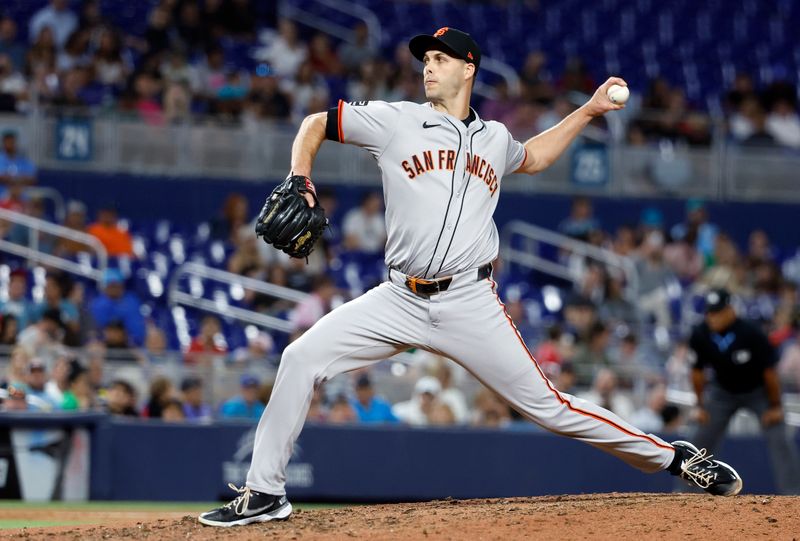 Apr 16, 2024; Miami, Florida, USA;  San Francisco Giants pitcher Nick Avila (58) delivers a pitch against the Miami Marlins the seventh inning at loanDepot Park. Mandatory Credit: Rhona Wise-USA TODAY Sports