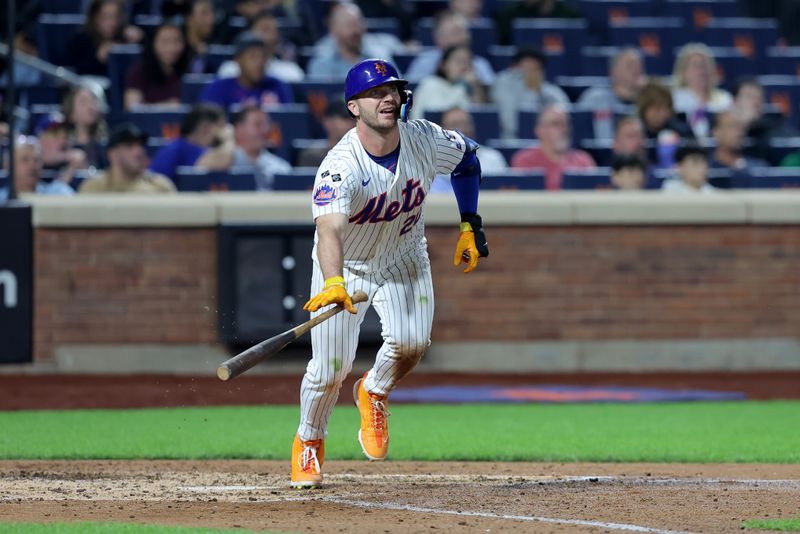 Sep 17, 2024; New York City, New York, USA; New York Mets first baseman Pete Alonso (20) follows through on a double against the Washington Nationals during the fifth inning at Citi Field. Mandatory Credit: Brad Penner-Imagn Images