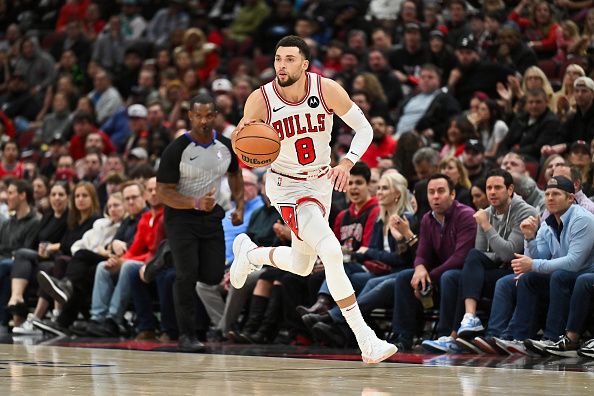 CHICAGO, ILLINOIS - NOVEMBER 15:  Zach Lavine #8 of the Chicago Bulls controls the ball against the Orlando Magic on November 15, 2023 at United Center in Chicago, Illinois.   NOTE TO USER: User expressly acknowledges and agrees that, by downloading and or using this photograph, User is consenting to the terms and conditions of the Getty Images License Agreement.  (Photo by Jamie Sabau/Getty Images)