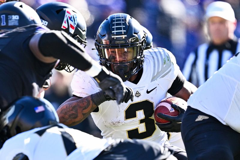 Nov 18, 2023; Evanston, Illinois, USA;  Purdue Boilermakers running back Tyrone Tracy Jr. (3) runs the ball in the second quarter against the Northwestern Wildcats at Ryan Field. Mandatory Credit: Jamie Sabau-USA TODAY Sports