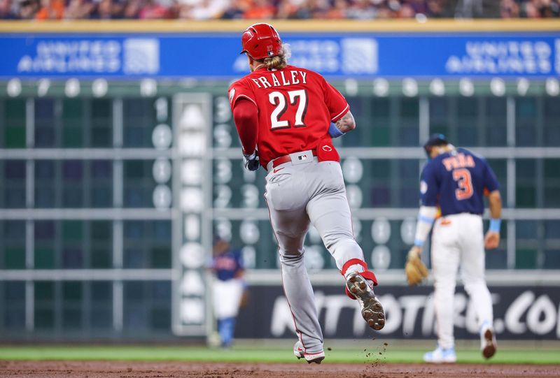 Jun 18, 2023; Houston, Texas, USA; Houston Astros shortstop Jeremy Pena (3) reacts and Cincinnati Reds left fielder Jake Fraley (27) rounds the bases after hitting a home run during the second inning at Minute Maid Park. Mandatory Credit: Troy Taormina-USA TODAY Sports