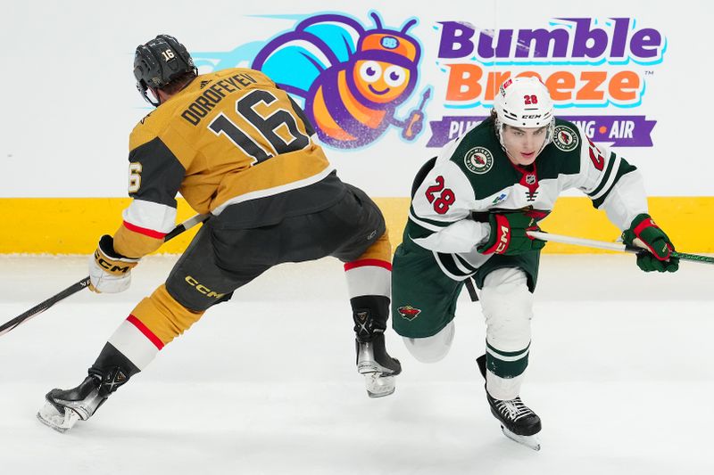 Apr 12, 2024; Las Vegas, Nevada, USA; Minnesota Wild left wing Liam Ohgren (28) slips the check of Vegas Golden Knights left wing Pavel Dorofeyev (16) during the third period at T-Mobile Arena. Mandatory Credit: Stephen R. Sylvanie-USA TODAY Sports