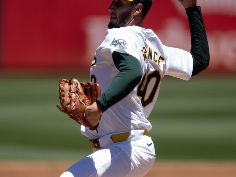 Jul 7, 2024; Oakland, California, USA; Oakland Athletics starting pitcher Mitch Spence (40) delivers a pitch against the Baltimore Orioles during the second inning at Oakland-Alameda County Coliseum. Mandatory Credit: D. Ross Cameron-USA TODAY Sports
