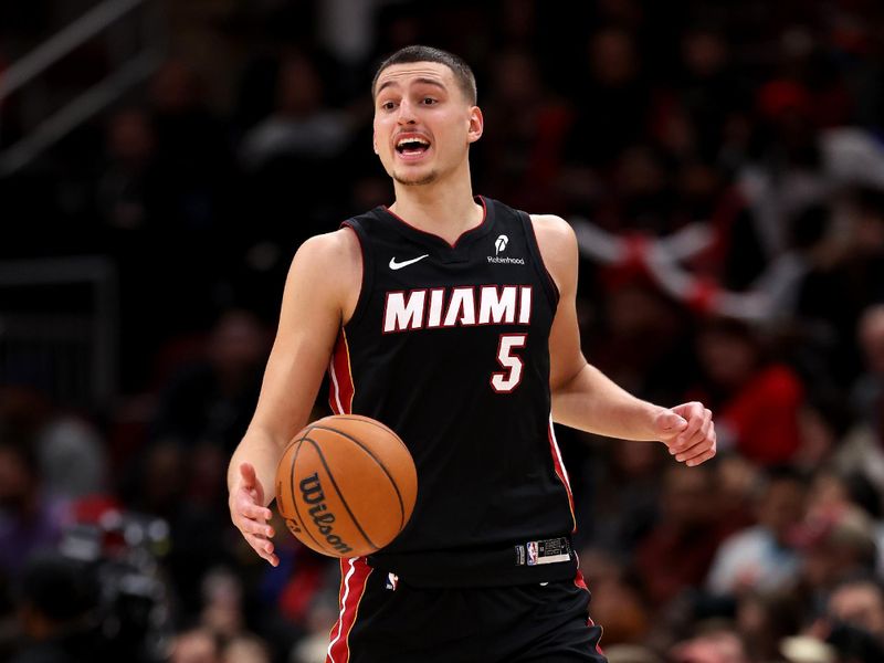 CHICAGO, ILLINOIS - FEBRUARY 04: Nikola Jovic #5 of the Miami Heat in action against the Chicago Bulls at the United Center on February 04, 2025 in Chicago, Illinois. NOTE TO USER: User expressly acknowledges and agrees that, by downloading and or using this photograph, user is consenting to the terms and conditions of the Getty Images License Agreement.  (Photo by Luke Hales/Getty Images)