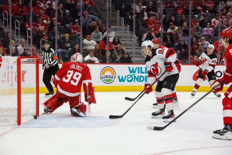 Nov 29, 2024; Detroit, Michigan, USA; Detroit Red Wings goaltender Cam Talbot (39) is scored on by New Jersey Devils right wing Timo Meier (28) during the first period at Little Caesars Arena. Mandatory Credit: Brian Bradshaw Sevald-Imagn Images