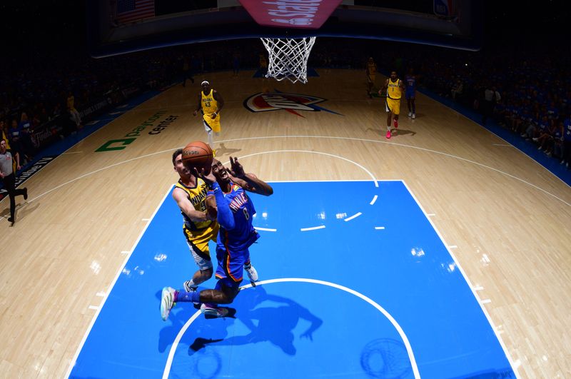 OKLAHOMA CITY, OK - JUNE 8: Jaylin Williams #6 of the Oklahoma City Thunder drives to the basket during the game against the Indiana Pacers during Game One of the 2025 NBA Finals on June 8, 2025 at Paycom Center in Oklahoma City, Oklahoma. NOTE TO USER: User expressly acknowledges and agrees that, by downloading and or using this photograph, User is consenting to the terms and conditions of the Getty Images License Agreement. Mandatory Copyright Notice: Copyright 2025 NBAE (Photo byGarrett Ellwood /NBAE via Getty Images)