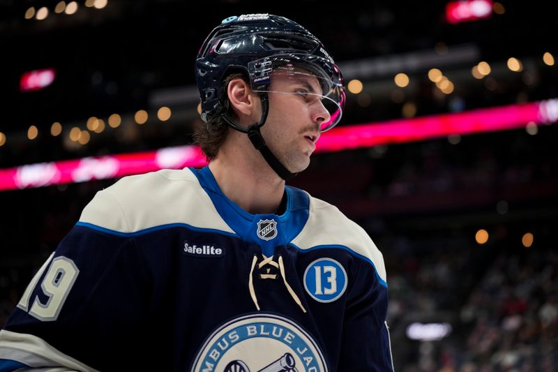 Nov 23, 2024; Columbus, Ohio, USA;  Columbus Blue Jackets center Adam Fantilli (19) awaits the face-off against the Carolina Hurricanes in the third period at Nationwide Arena. Mandatory Credit: Aaron Doster-Imagn Images