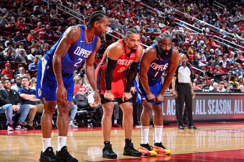 HOUSTON, TX - MARCH 6: Dillon Brooks #9 of the Houston Rockets and Kawhi Leonard #2 and James Harden #1 of the LA Clippers look on during the game on March 6, 2024 at the Toyota Center in Houston, Texas. NOTE TO USER: User expressly acknowledges and agrees that, by downloading and or using this photograph, User is consenting to the terms and conditions of the Getty Images License Agreement. Mandatory Copyright Notice: Copyright 2024 NBAE (Photo by Logan Riely/NBAE via Getty Images)