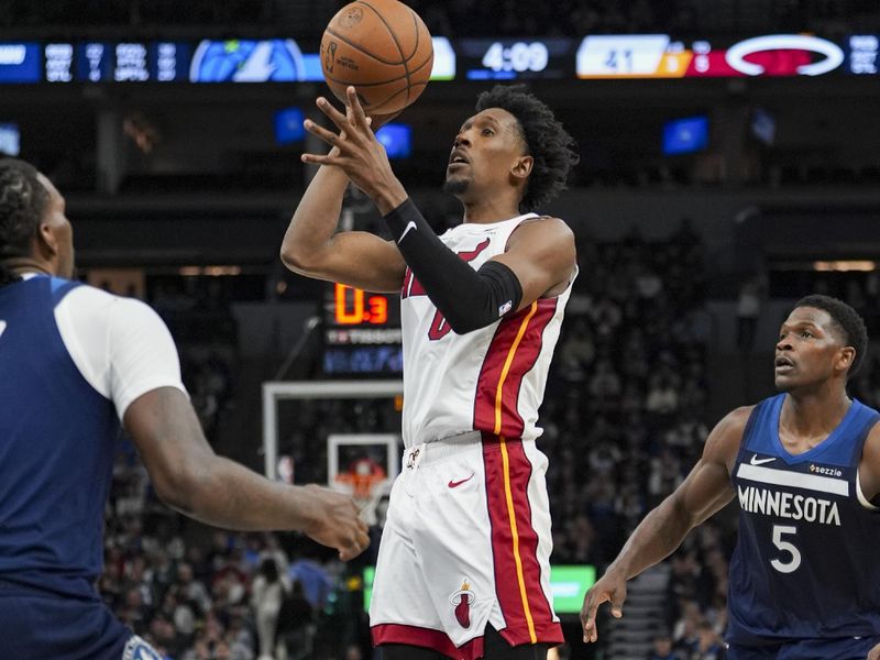 MINNEAPOLIS, MN -  NOVEMBER 10:  Josh Richardson #0 of the Miami Heat shoots the ball during the game against the Minnesota Timberwolves on November 10, 2024 at Target Center in Minneapolis, Minnesota. NOTE TO USER: User expressly acknowledges and agrees that, by downloading and or using this Photograph, user is consenting to the terms and conditions of the Getty Images License Agreement. Mandatory Copyright Notice: Copyright 2024 NBAE (Photo by Jordan Johnson/NBAE via Getty Images)