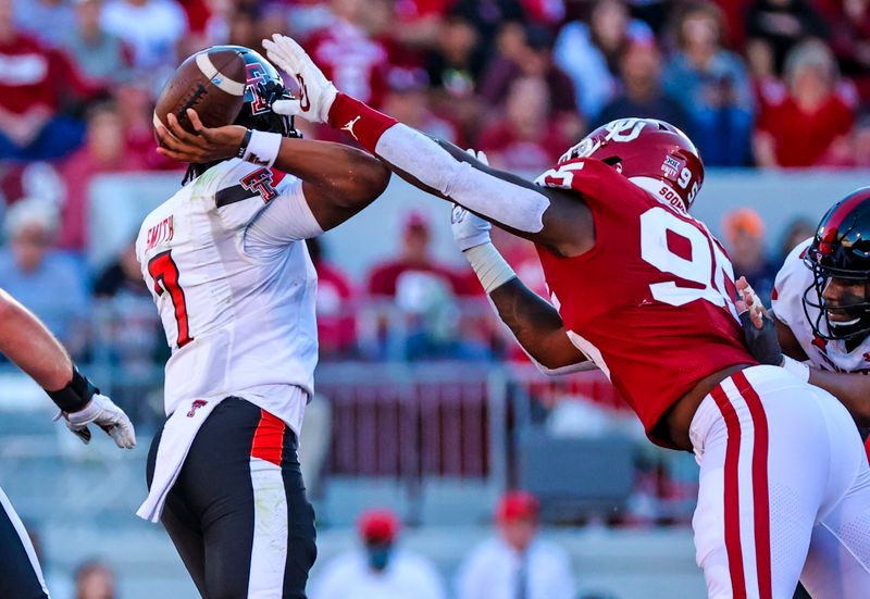 Oct 30, 2021; Norman, Oklahoma, USA; Oklahoma Sooners defensive lineman Isaiah Thomas (95) causes Texas Tech Red Raiders quarterback Donovan Smith (7) to fumble during the second half at Gaylord Family-Oklahoma Memorial Stadium. Mandatory Credit: Kevin Jairaj-USA TODAY Sports