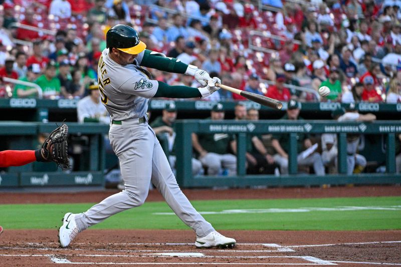 Aug 14, 2023; St. Louis, Missouri, USA;  Oakland Athletics designated hitter Brent Rooker (25) hits a single against the St. Louis Cardinals during the second inning at Busch Stadium. Mandatory Credit: Jeff Curry-USA TODAY Sports