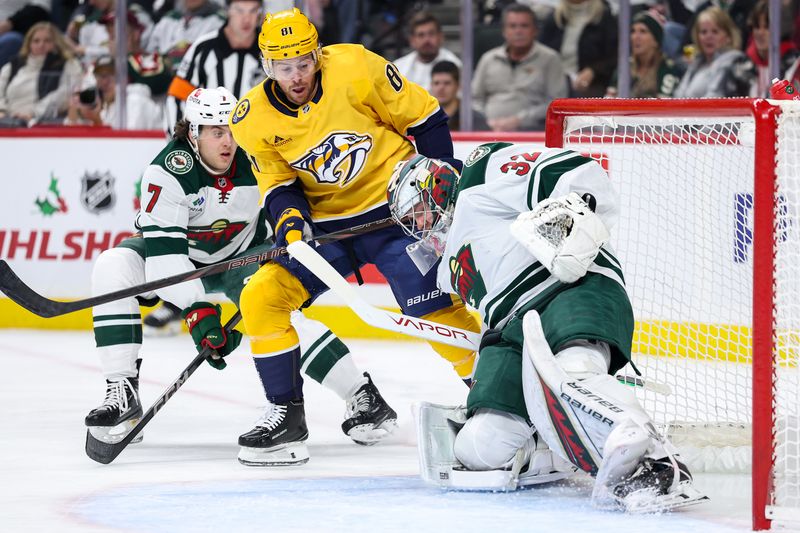 Nov 30, 2024; Saint Paul, Minnesota, USA; Minnesota Wild goaltender Filip Gustavsson (32) defends his net as Nashville Predators center Jonathan Marchessault (81) attempts a shot during the first period at Xcel Energy Center. Mandatory Credit: Matt Krohn-Imagn Images