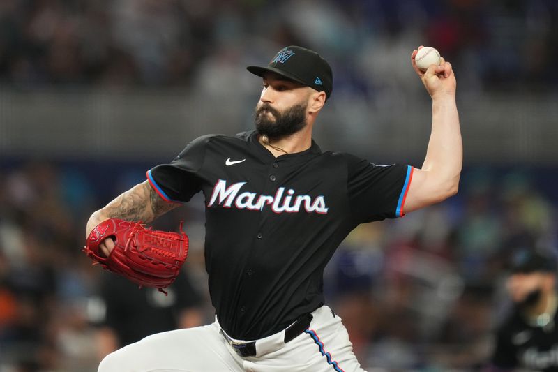 Jun 7, 2024; Miami, Florida, USA;  Miami Marlins pitcher Tanner Scott (66) pitches in the ninth inning against the Cleveland Guardians at loanDepot Park. Mandatory Credit: Jim Rassol-USA TODAY Sports