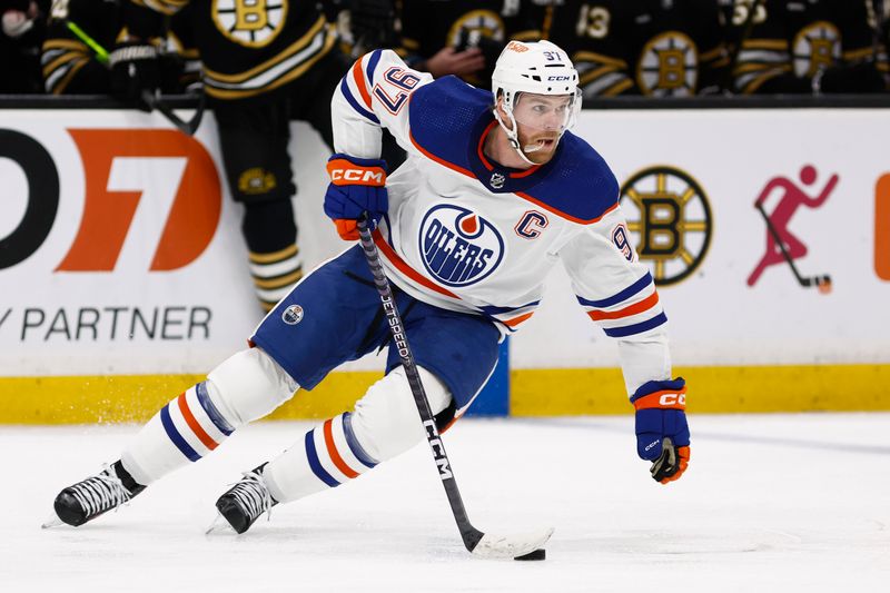 Mar 5, 2024; Boston, Massachusetts, USA; Edmonton Oilers center Connor McDavid (97) turns to go up ice with the puck during the second period against the Boston Bruins at TD Garden. Mandatory Credit: Winslow Townson-USA TODAY Sports