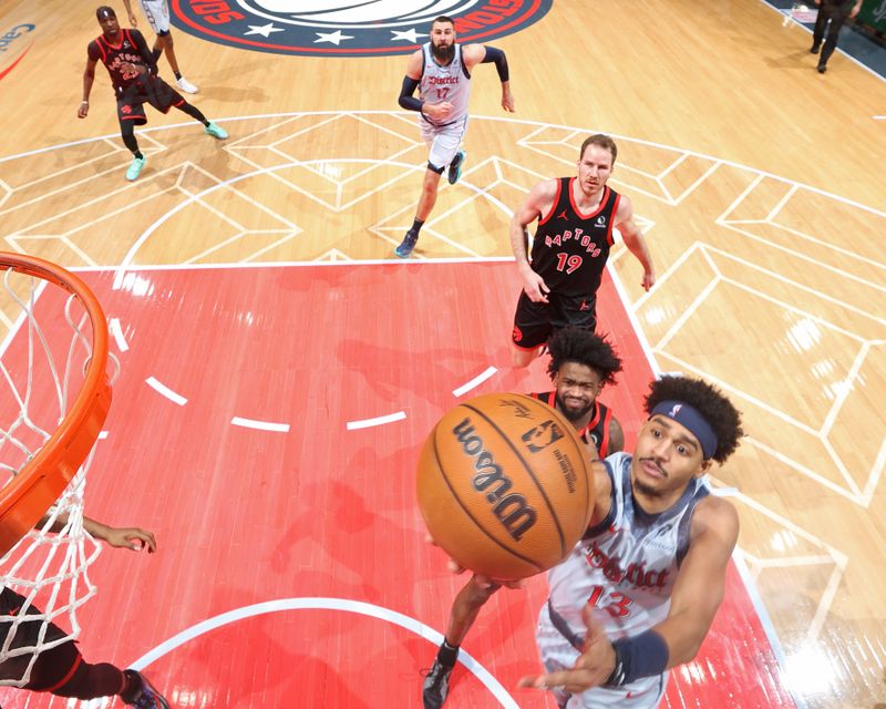 WASHINGTON, DC -?JANUARY 29: Jordan Poole #13 of the Washington Wizards drives to the basket during the game against the Toronto Raptors on January 29, 2025 at Capital One Arena in Washington, DC. NOTE TO USER: User expressly acknowledges and agrees that, by downloading and or using this Photograph, user is consenting to the terms and conditions of the Getty Images License Agreement. Mandatory Copyright Notice: Copyright 2025 NBAE (Photo by Stephen Gosling/NBAE via Getty Images)