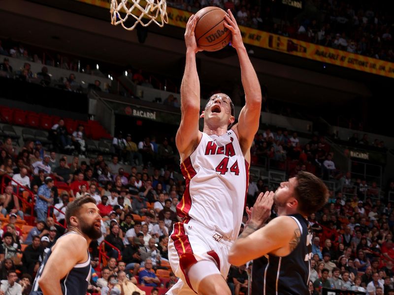 MIAMI, FL - APRIL 1: Cody Zeller #44 of the Miami Heat drives to the basket during the game against the Dallas Mavericks  on April 1, 2023 at Miami-Dade Arena in Miami, Florida. NOTE TO USER: User expressly acknowledges and agrees that, by downloading and or using this Photograph, user is consenting to the terms and conditions of the Getty Images License Agreement. Mandatory Copyright Notice: Copyright 2023 NBAE (Photo by Issac Baldizon/NBAE via Getty Images)