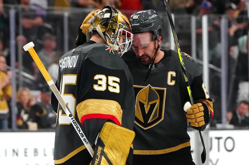 Oct 13, 2024; Las Vegas, Nevada, USA; Vegas Golden Knights right wing Mark Stone (61) congratulates goaltender Ilya Samsonov (35) after the they defeated the Anaheim Ducks 3-1 at T-Mobile Arena. Mandatory Credit: Stephen R. Sylvanie-Imagn Images