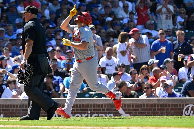 Jun 14, 2024; Chicago, Illinois, USA;  St. Louis Cardinals catcher Pedro Pages (43) points after he hits a home run during the eighth inning against the Chicago Cubs  at Wrigley Field. Mandatory Credit: Matt Marton-USA TODAY Sports