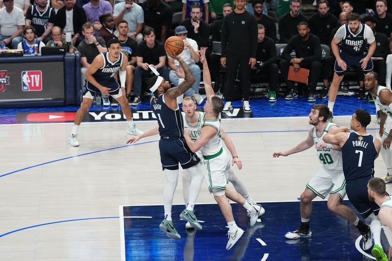 DALLAS, TX - JUNE 14: Jaden Hardy #1 of the Dallas Mavericks shoots the ball during the game against the Boston Celtics during Game Four of the 2024 NBA Finals on June 14, 2024 at the American Airlines Center in Dallas, Texas. NOTE TO USER: User expressly acknowledges and agrees that, by downloading and or using this photograph, User is consenting to the terms and conditions of the Getty Images License Agreement. Mandatory Copyright Notice: Copyright 2024 NBAE (Photo by Glenn James/NBAE via Getty Images)