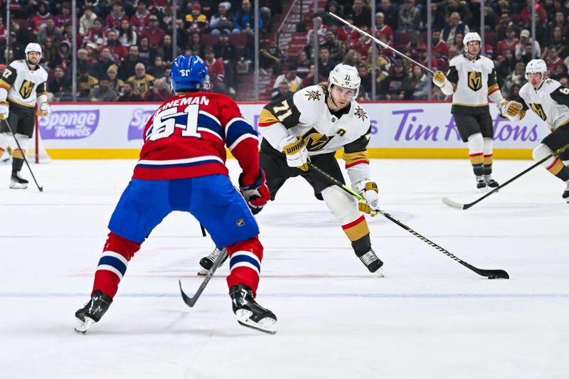 Nov 23, 2024; Montreal, Quebec, CAN; Las Vegas Golden Knights center William Karlsson (71) plays the puck against Montreal Canadiens left wing Emil Heineman (51) during the first period at Bell Centre. Mandatory Credit: David Kirouac-Imagn Images