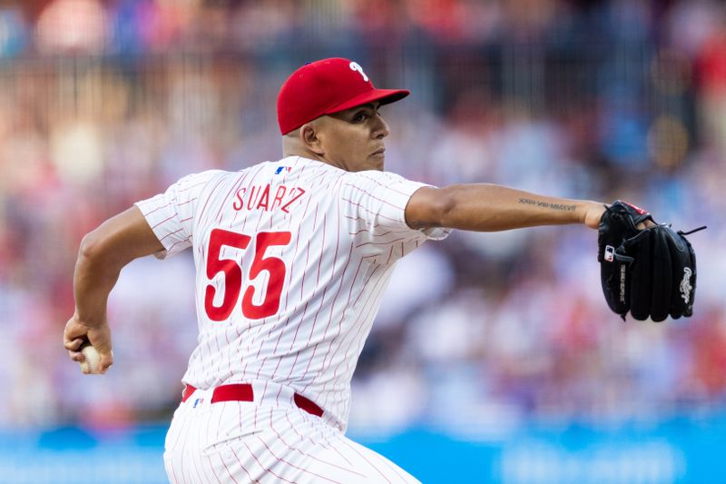 May 21, 2024; Philadelphia, Pennsylvania, USA; Philadelphia Phillies pitcher Ranger Suárez (55) throws a pitch against the Texas Rangers at Citizens Bank Park. Mandatory Credit: Bill Streicher-USA TODAY Sports