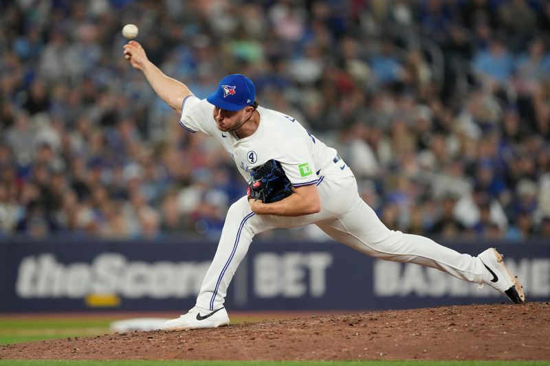 Jun 2, 2024; Toronto, Ontario, CAN; Toronto Blue Jays pitcher Nate Pearson (24) pitches to the Pittsburgh Pirates during the eighth inning at Rogers Centre. Mandatory Credit: John E. Sokolowski-USA TODAY Sports