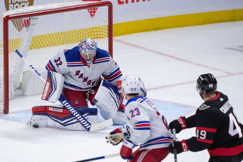 Jan 27, 2024; Ottawa, Ontario, CAN; New York Rangers goalie Jonathan Quick (32) makes a save on a shot from Ottawa Senators center Rourke Chartier (49) in the third period at the Canadian Tire Centre. Mandatory Credit: Marc DesRosiers-USA TODAY Sports