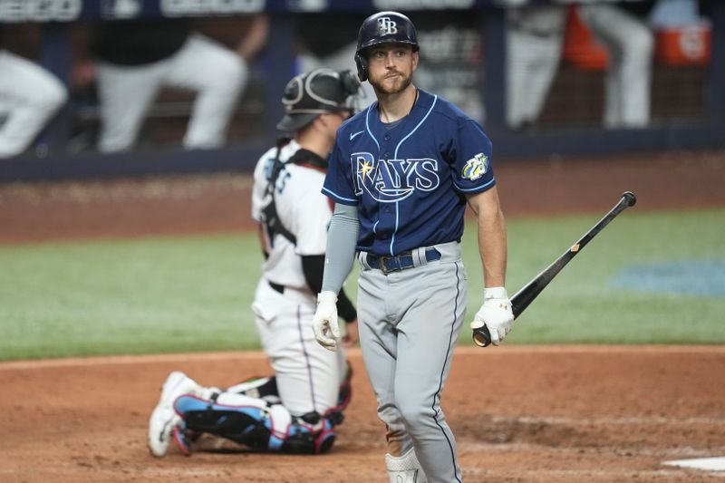 Aug 30, 2023; Miami, Florida, USA; Tampa Bay Rays second baseman Brandon Lowe (8) strikes out in the ninth inning against the Miami Marlins at loanDepot Park. Mandatory Credit: Jim Rassol-USA TODAY Sports